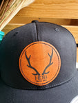 Black on Black Trucker Hat Antler Logo